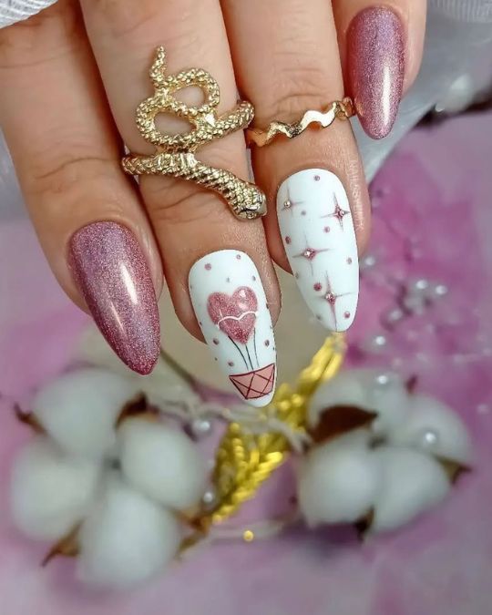 Almond-shaped nails featuring shimmering rose gold and crisp white, adorned with a cute heart balloon design