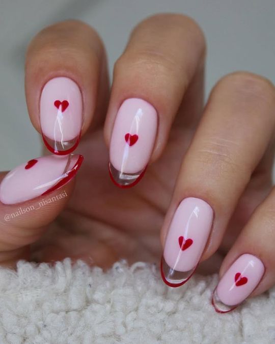 pink nails with red French tips and tiny heart for Valentine's Day