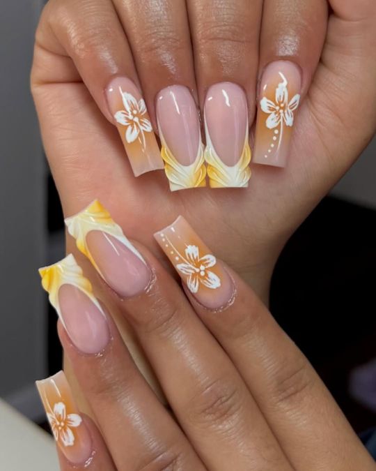 45 Best Summer Nail Ideas to Heat Up Your Style 7 long square nails yellow white french tip with swirls and flowers
