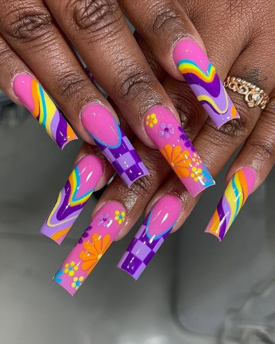 45 Best Summer Nail Ideas to Heat Up Your Style 24 a mix of purple, pink and yellow with creative hand drawing patterns on long square nails