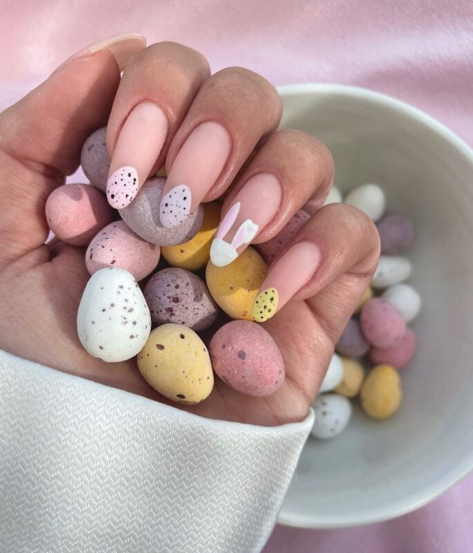 20 Instagram-Worthy Easter Nail Art Trends for 2025 15 mini eggs French mani long round nails