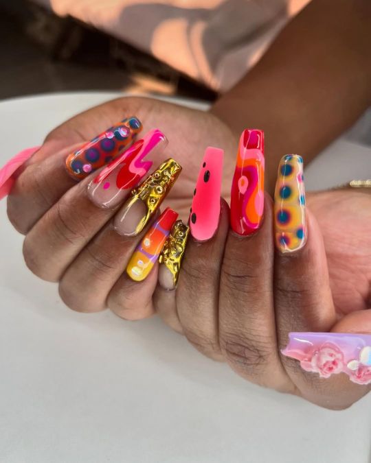 45 Best Summer Nail Ideas to Heat Up Your Style 30 long coffin nails with a mix of hot pinks, electric blues, and pops of gold
