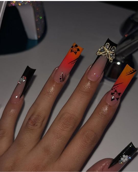 45 Best Summer Nail Ideas to Heat Up Your Style 17 long square nails black and orange french tips with butterfly jewel