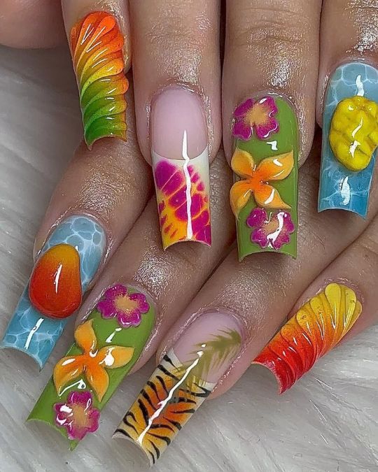 45 Best Summer Nail Ideas to Heat Up Your Style 21 long square nails with tropical icons featuring rainbow, flowers, fruits, and tiger stripes