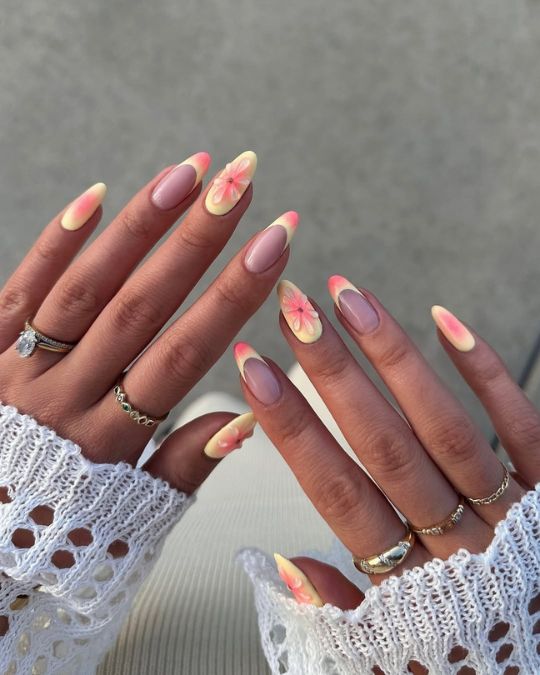 45 Best Summer Nail Ideas to Heat Up Your Style 3 Almond nails pink-yellow ombre and delicate flower and french tip