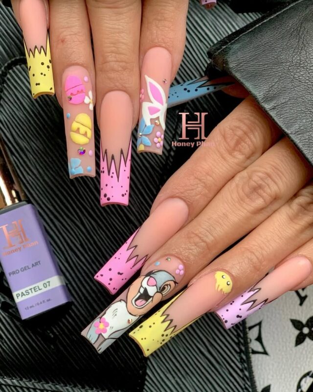 20 Instagram-Worthy Easter Nail Art Trends for 2025 10 long square nails with cartoon patterns and matte finish
