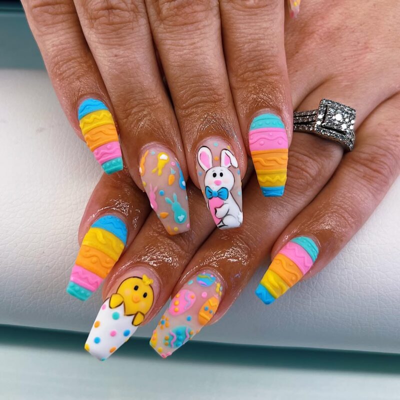 20 Instagram-Worthy Easter Nail Art Trends for 2025 11 playful bunny and chicken easter-inspired colors long coffin nails