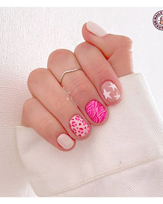 45 Best Summer Nail Ideas to Heat Up Your Style 8 cute summer nails short round nails with with zebra stripes, leopard spots, and stars