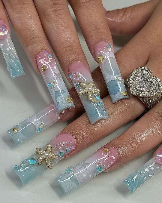45 Best Summer Nail Ideas to Heat Up Your Style 2 Long square nails with ocean-inspired icons for summer nail