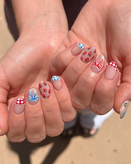 45 Best Summer Nail Ideas to Heat Up Your Style 38 4th of july inspired short round nails with mix of red, white, and blue patterns