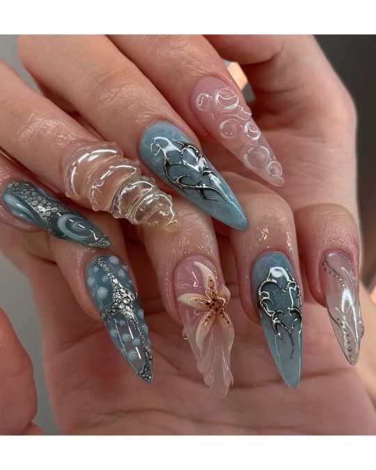 40 Beachy Nail Ideas for Every Style and Occasion 17 Oceanic Fantasy Claws