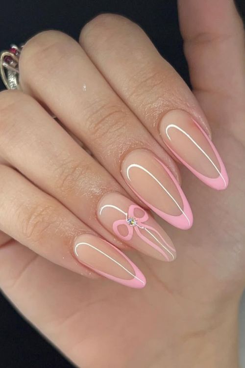 30 Stunning Graduation Nail Designs to Celebrate Your Big Day in 2025 18 Dainty Pink Bow Design