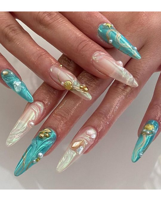40 Beachy Nail Ideas for Every Style and Occasion 20 Ocean Princess Dreams