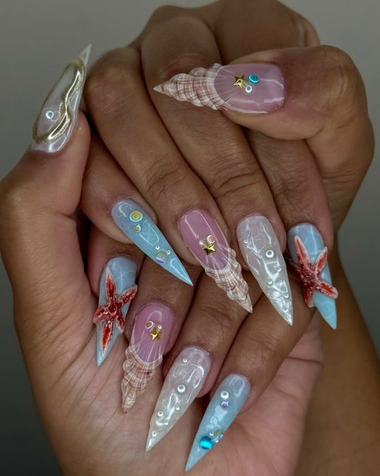 40 Beachy Nail Ideas for Every Style and Occasion 33 Seashell Symphony Nails