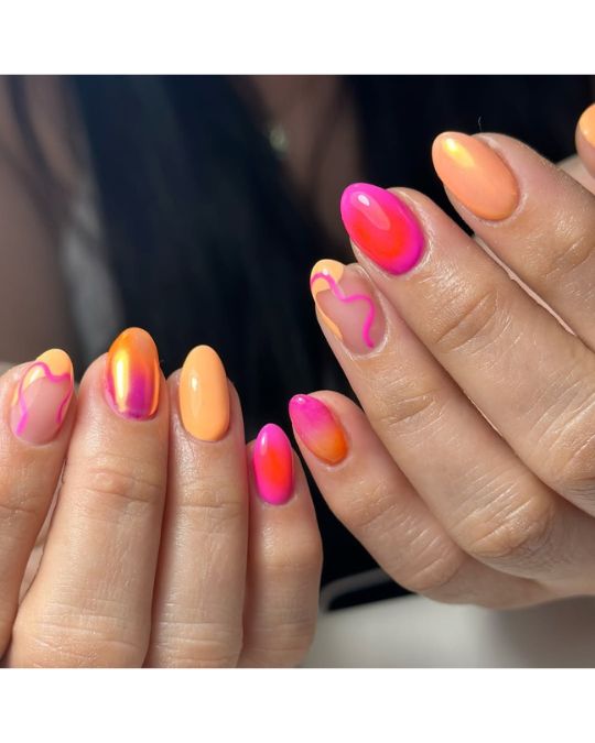40 Beachy Nail Ideas for Every Style and Occasion 29 Sunset Swirl Nails