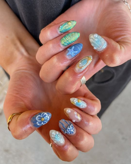 40 Beachy Nail Ideas for Every Style and Occasion 31 Ocean Dreams Nails