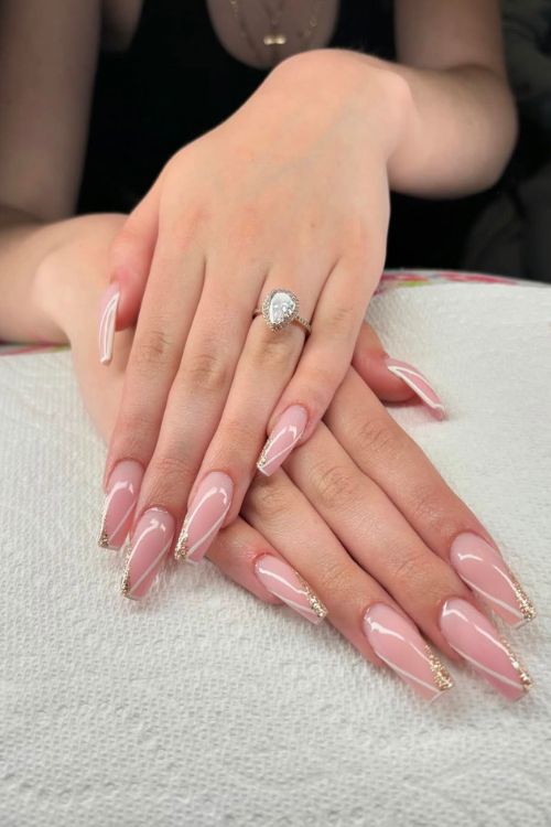 30 Stunning Graduation Nail Designs to Celebrate Your Big Day in 2025 15 nails by tanya field Subtle Blush Sparkle