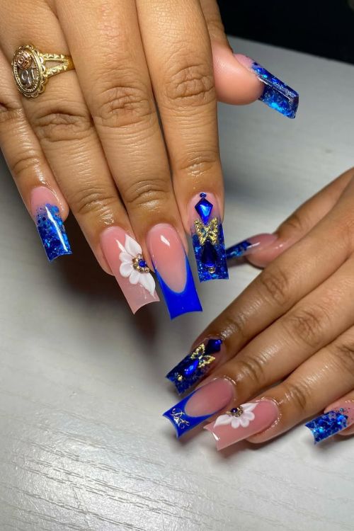 40 Prom Nails: Picture-Perfect Designs for Your Big Moment 8 Sapphire Blossom Stunners