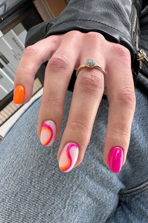 30 Stunning Graduation Nail Designs to Celebrate Your Big Day in 2025 4 Vibrant Swirl Accents